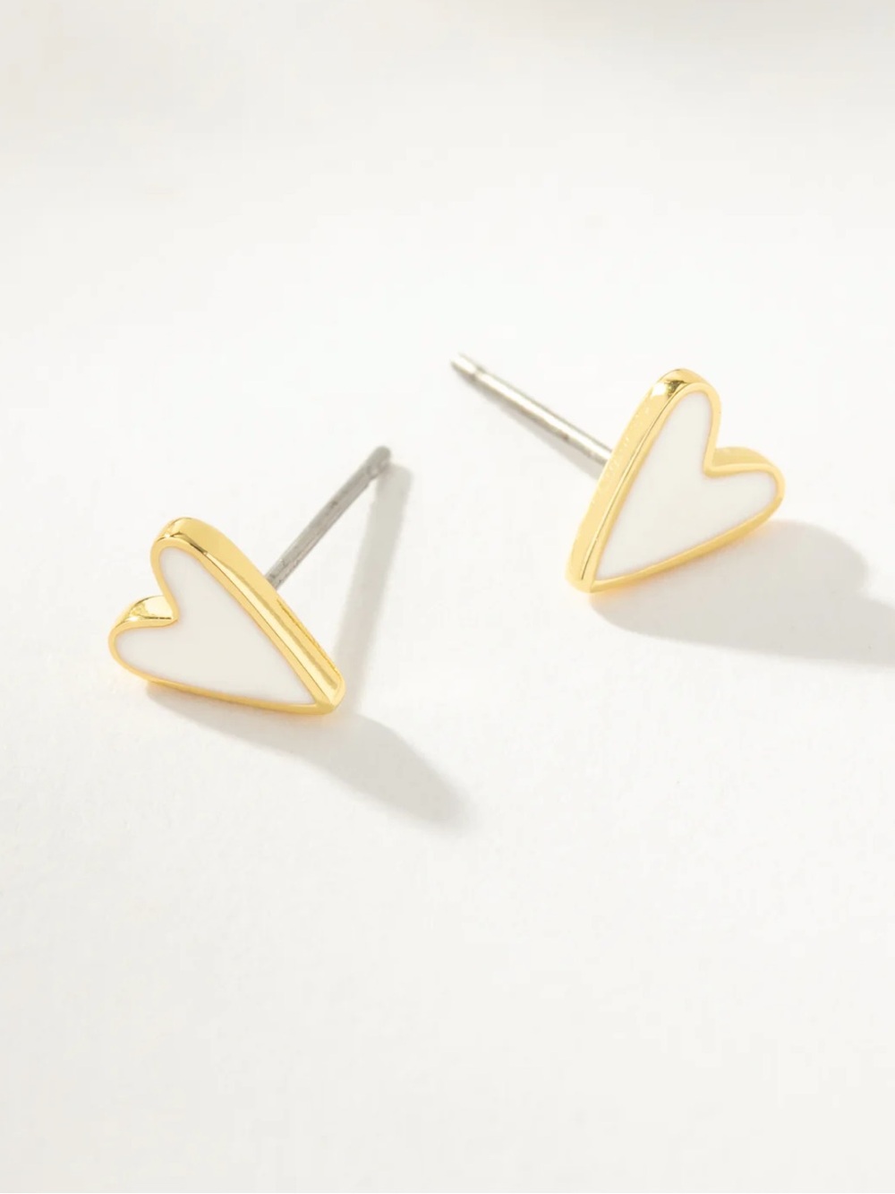 Uncommon James- White Heart Studs 💚